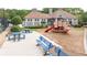 Community playground area with a building, picnic tables and benches at 1634 Crittenden Ln, Lawrenceville, GA 30043