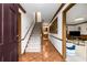 Spacious foyer with hardwood floors, staircase, and trim at 2747 Livsey Trl, Tucker, GA 30084