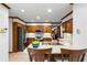 Updated kitchen with stainless steel appliances, an island with bar stool seating, and ample cabinet space at 2747 Livsey Trl, Tucker, GA 30084