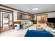 Cozy living area with comfortable seating, open layout to dining room at 2747 Livsey Trl, Tucker, GA 30084