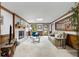 Inviting living room features fireplace, neutral carpet, and wood trim at 2747 Livsey Trl, Tucker, GA 30084