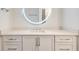 Bathroom vanity features shaker-style cabinets, polished chrome hardware, and white countertop at 625 Piedmont Ne Ave # 2004, Atlanta, GA 30308