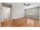 Bedroom features hardwood floors, ceiling fan, and lots of natural light at 1396 Elizabeth Ln, Atlanta, GA 30344