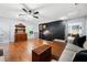 Bright bonus room featuring hardwood floors, a ceiling fan, access to rooms, and modern decor at 2069 Brightleaf Way # 123, Marietta, GA 30060
