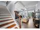 Inviting entryway and stairway lead into a bright, open-concept living space at 2069 Brightleaf Way # 123, Marietta, GA 30060