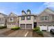 Charming brick townhome featuring a two-car garage and well-maintained landscaping at 2069 Brightleaf Way # 123, Marietta, GA 30060