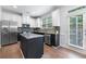 Stylish kitchen with stainless steel appliances, granite counters, and easy access to deck at 2069 Brightleaf Way # 123, Marietta, GA 30060