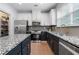 Modern kitchen with stainless steel appliances, granite countertops, and custom cabinetry at 2069 Brightleaf Way # 123, Marietta, GA 30060
