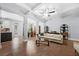 Open concept living room offering seamless flow to kitchen and dining, featuring coffered ceilings at 2069 Brightleaf Way # 123, Marietta, GA 30060