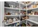 Organized pantry with shelves stocked full of goods at 2069 Brightleaf Way # 123, Marietta, GA 30060