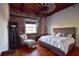 Charming bedroom features exposed brick, wood floors, and a cozy sitting area at 490 Marietta St Nw # 307, Atlanta, GA 30313