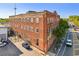 Exterior of a brick building with street view, highlighting the architectural details and urban setting at 490 Marietta St Nw # 307, Atlanta, GA 30313