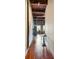 Hallway of industrial home featuring hardwood floors, rustic beams and a cool elevator at 490 Marietta St Nw # 307, Atlanta, GA 30313
