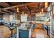 Modern kitchen with granite countertops, stainless steel appliances, and brick wall accents at 490 Marietta St Nw # 307, Atlanta, GA 30313