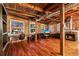 Spacious living room with brick wall, wood beams, fireplace and hardwood floors throughout at 490 Marietta St Nw # 307, Atlanta, GA 30313