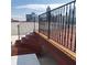 This rooftop deck features wood flooring and a wrought iron railing, offering great city views at 490 Marietta St Nw # 307, Atlanta, GA 30313