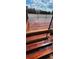This rooftop deck features wood flooring and a wrought iron railing that is wet at 490 Marietta St Nw # 307, Atlanta, GA 30313