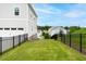 This home features a spacious backyard, perfect for outdoor activities and relaxation at 831 Corsiglia Farm Flts, Marietta, GA 30060