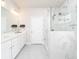Stylish bathroom featuring a double sink vanity, a shower with a glass door, and modern fixtures at 831 Corsiglia Farm Flts, Marietta, GA 30060