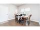Cozy dining area with hardwood floors and a window providing natural light at 831 Corsiglia Farm Flts, Marietta, GA 30060