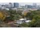 Scenic aerial view of the house surrounded by lush trees with Atlanta city views at 1186A Francis Nw St, Atlanta, GA 30318