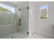 Bright and modern bathroom with walk-in shower featuring glass doors and sleek fixtures at 1186A Francis Nw St, Atlanta, GA 30318