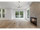 Inviting living room featuring hardwood floors, fireplace, and bright natural light at 1186B Francis Nw St, Atlanta, GA 30318