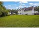 Spacious backyard with green grass and ample room for outdoor activities at 3822 River Ridge Ct, Decatur, GA 30034