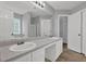Spacious bathroom includes a double vanity, lots of cabinet space, and tile flooring at 3822 River Ridge Ct, Decatur, GA 30034