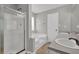 Bathroom featuring a walk-in shower, bathtub, double vanity and tile flooring at 3822 River Ridge Ct, Decatur, GA 30034