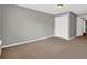 Spacious bedroom with carpet flooring, light gray walls, and a double door closet at 3822 River Ridge Ct, Decatur, GA 30034