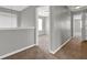 Hallway with carpet flooring, neutral paint, and natural light coming through the window at 3822 River Ridge Ct, Decatur, GA 30034