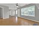 Bright living room with hardwood floors and large windows for natural light at 3822 River Ridge Ct, Decatur, GA 30034