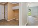 Laundry room with door and hanging cabinets at 4179 Westchester Ne Xing, Roswell, GA 30075