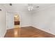 Main bedroom with hardwood floors and bathroom access at 4179 Westchester Ne Xing, Roswell, GA 30075