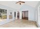 Sunroom with windows and access to deck and kitchen at 4179 Westchester Ne Xing, Roswell, GA 30075