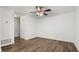 Bright and open living area features neutral walls and hardwood floors, perfect for modern living at 49 Country Ct, Alpharetta, GA 30005