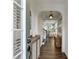 Stylish entryway with hardwood floors, modern console table, and an open view to the living space at , Lawrenceville, GA 30044