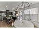 Eat-in kitchen features stainless steel appliances, granite counters, a wine fridge and dark wood cabinets at , Lawrenceville, GA 30044