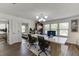 Home office with desk, dual monitors, built-in shelving, guest suite and large windows at , Lawrenceville, GA 30044