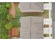 Aerial view showcasing multiple townhome roofs and green backyards at 109 Camden Park Dr, Woodstock, GA 30188