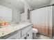 Bathroom with single sink vanity with granite countertops, and linen closet at 109 Camden Park Dr, Woodstock, GA 30188