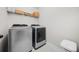 Well-equipped laundry room with modern washer and dryer for convenient home chores at 109 Camden Park Dr, Woodstock, GA 30188
