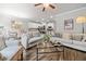 Spacious living room featuring a dining area, open kitchen, and cozy seating area at 109 Camden Park Dr, Woodstock, GA 30188