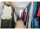 Well-organized walk-in closet for ample storage of clothes and accessories at 109 Camden Park Dr, Woodstock, GA 30188