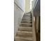 Staircase view exhibiting the need of renovation at 119 E Johnson St, Temple, GA 30179