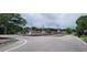 Street view of a town crossing railroad tracks near a business district on a cloudy day at 119 E Johnson St, Temple, GA 30179