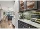 Gourmet kitchen features marble countertops, a gray brick backsplash, and stainless appliances at 3665 Pennington Rd, Cumming, GA 30041
