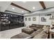 Basement with a comfortable seating area and a large built-in entertainment center at 3665 Pennington Rd, Cumming, GA 30041