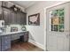 Charming office with custom cabinets, desk, and decorative accents at 3665 Pennington Rd, Cumming, GA 30041
